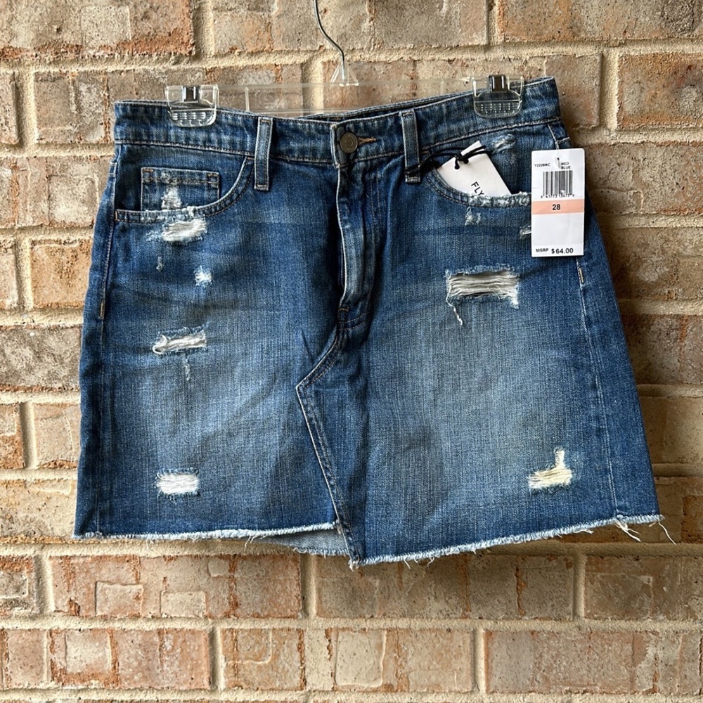 New with tags.   Flying Monkey Blue denim skirt with frayed hem